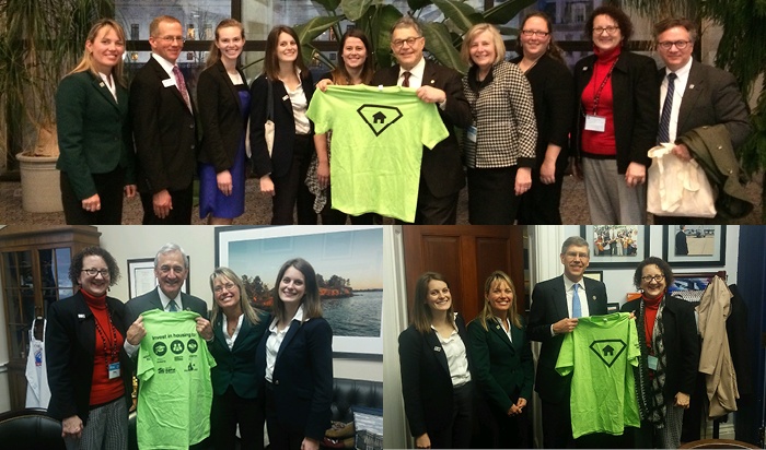 Staff from Twin Cities Habitat pose for pictures with Senator Franken, Representative Nolan, and Representative Paulsen.