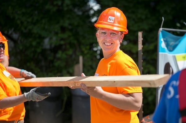 A happy volunteer from Andersen's Women Build Team