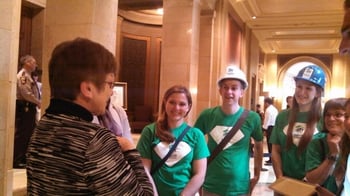 Housing advocates with Representative Alice Hausman.