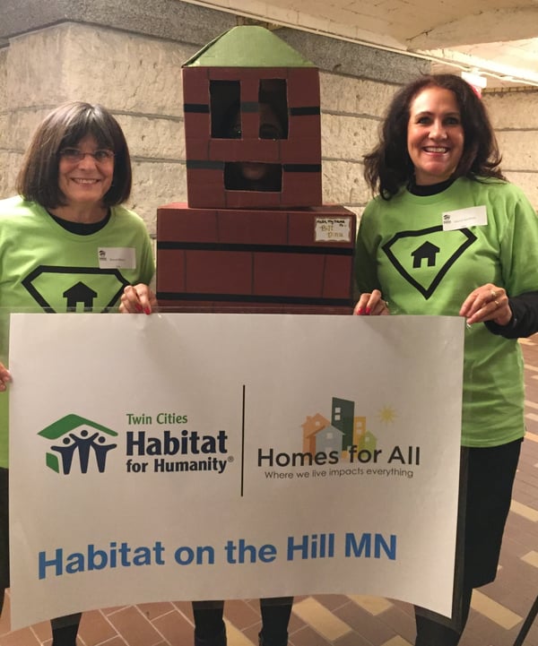 Sharon and her friend with "Bill Ding," our housing advocacy mascot.