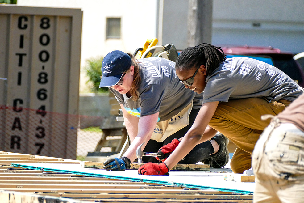 Volunteers working on the House that Beer Built