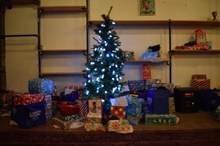 Tree and gifts at the event for Khan residents.