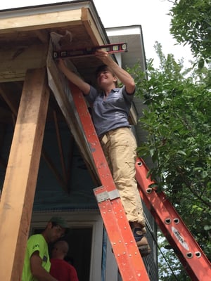 Robyn on a ladder.