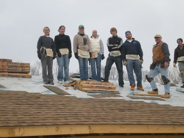 Bob roofing with college students