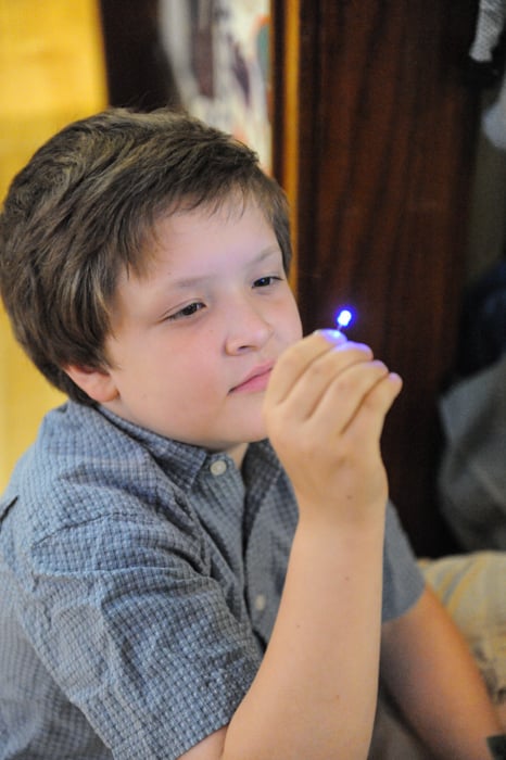 Erik holding his soldering kit