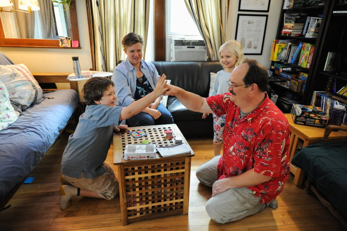 Erik and his family playing a game