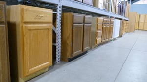 A row of cupboards and cabinets.