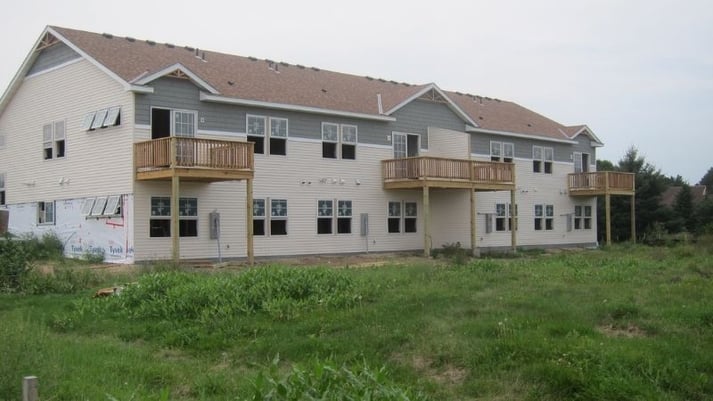 A Habitat triplex home construction.