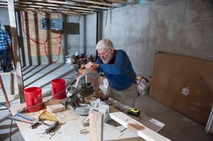 Don with a power saw.