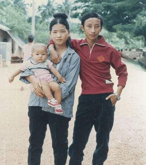 Bao and Chou in Thailand with their daughter, Kalia