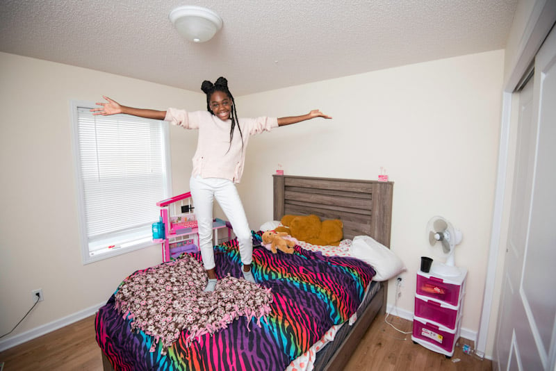 LeAndra's daughter daughter showing off her bedroom.