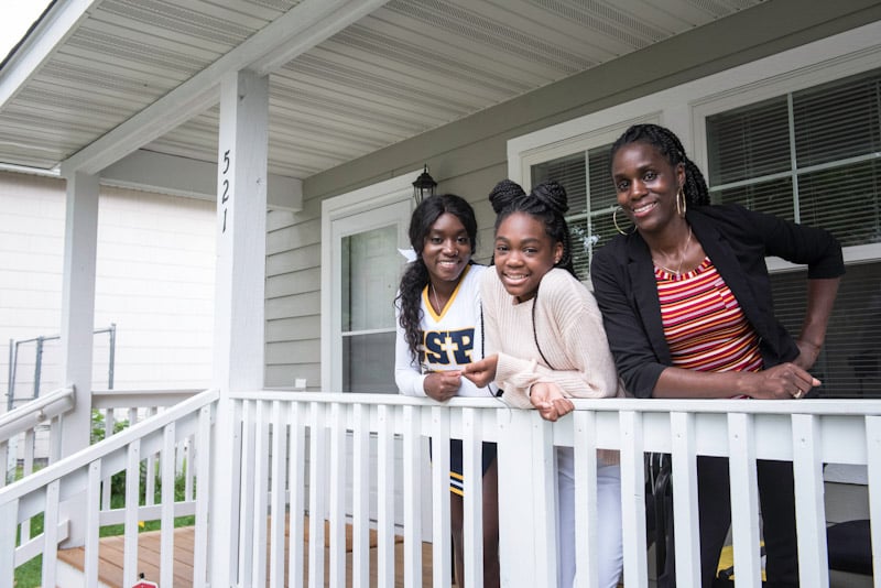 LeAndras family on the front porch