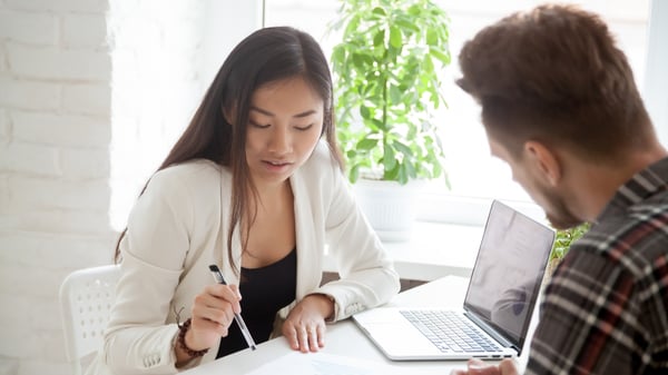 financial advisor going over homeownership advice with potential homebuyer.