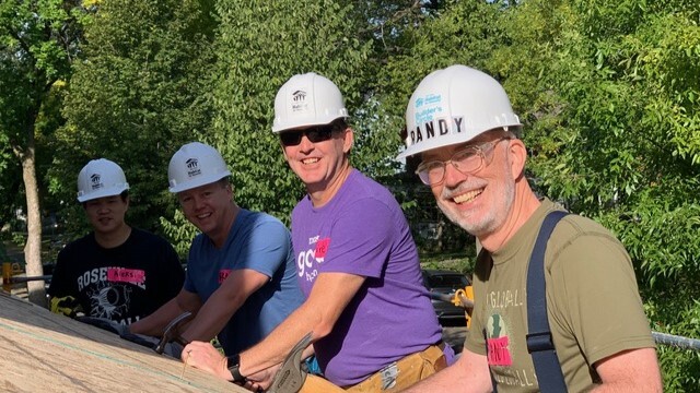 Randy (far right) working on site.