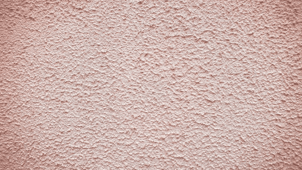A pink textured wall.