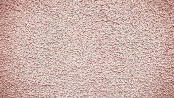 A pink textured wall.