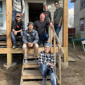 volunteers on steps 300x300
