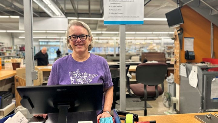 ReStore Volunteer Hope working the register