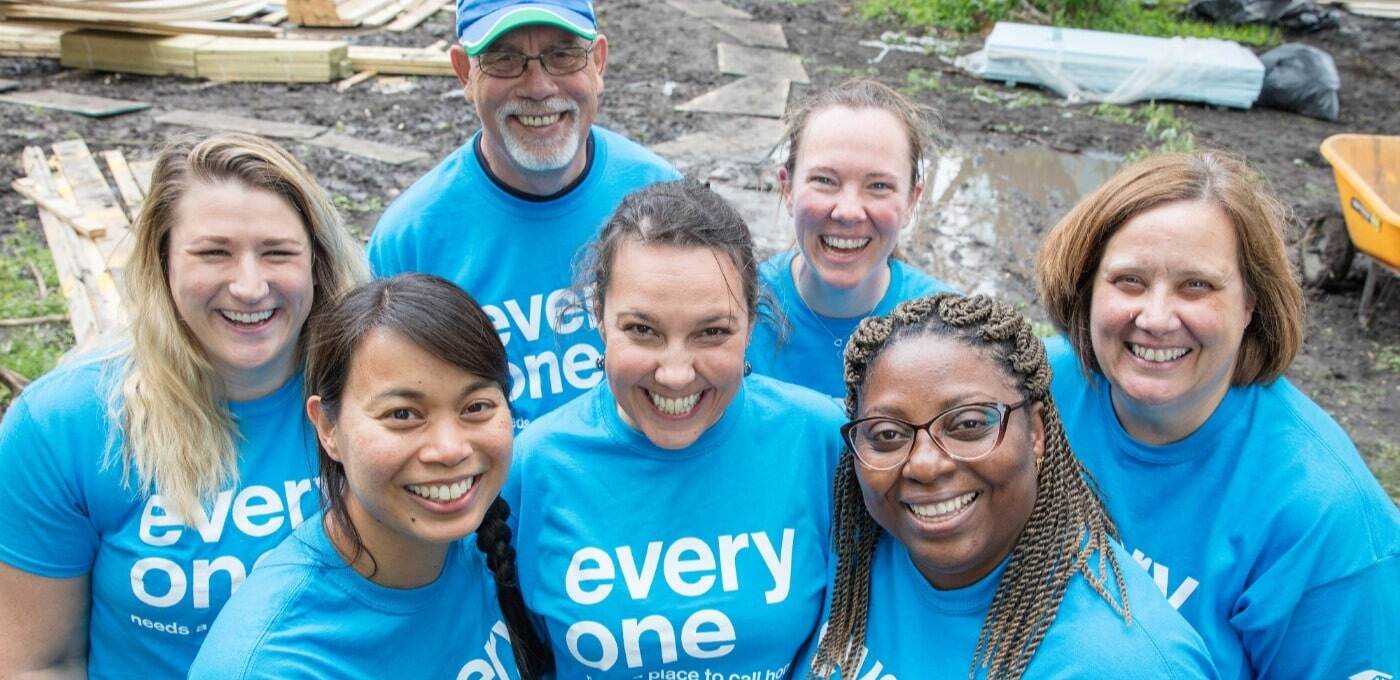 Smiling volunteers.