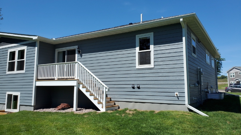 Double-level twin home backyard