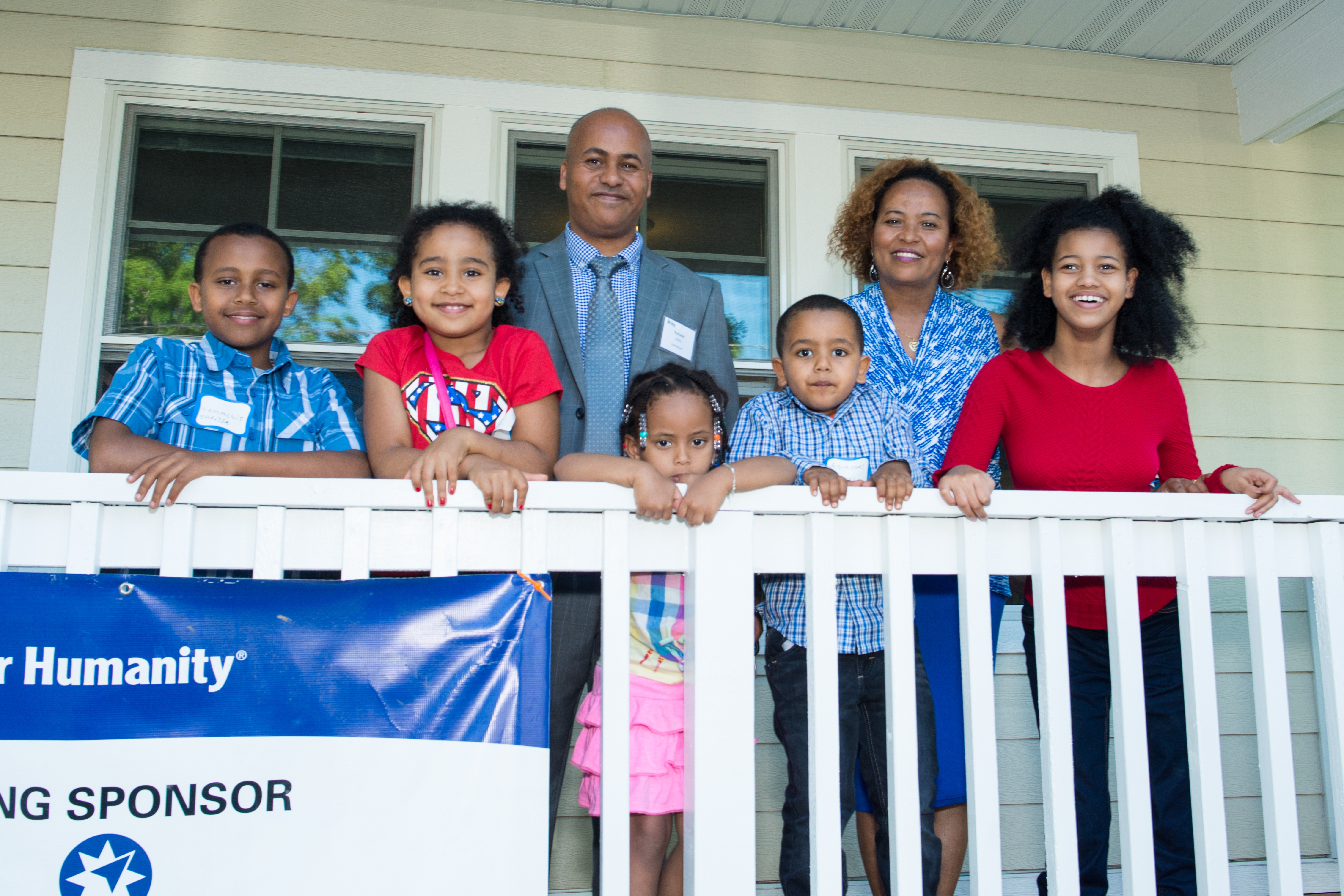 Two Families Reflect On Faith At Their Home Dedication
