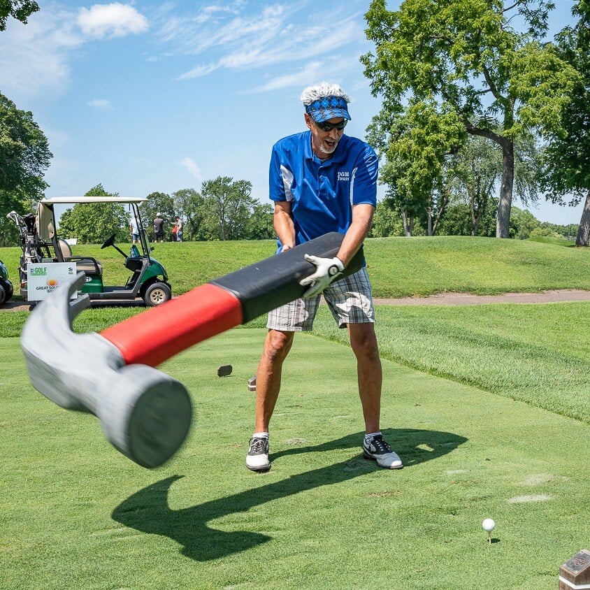 Golfer with hammer prop.
