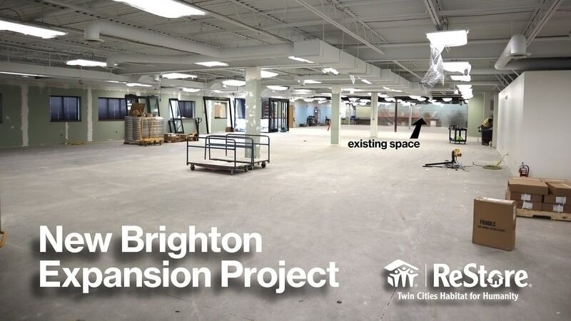 The interior of the New Brighton location under construction. White text says 