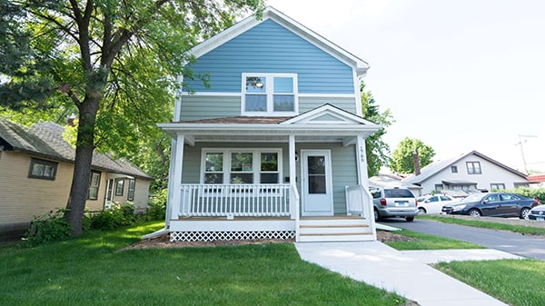 A blue Habitat home.