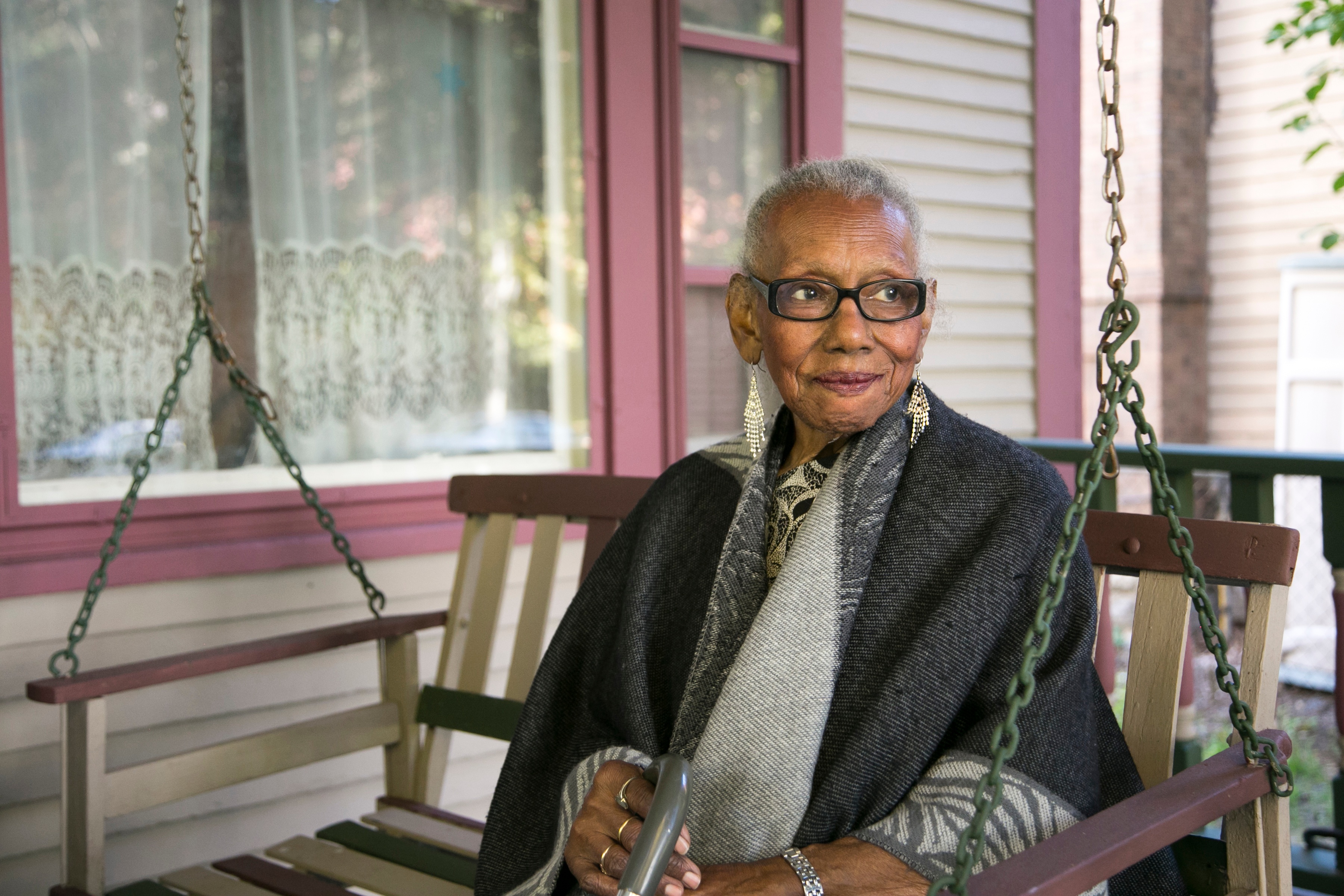 Senior in front of her home-1