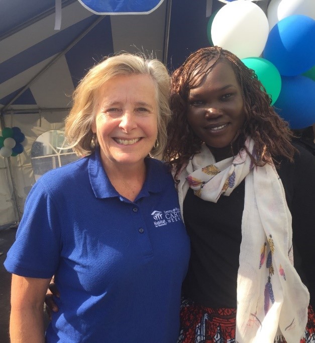 Twin Cities CEOs volunteer and hear homebuying story from South Sudanese refugee