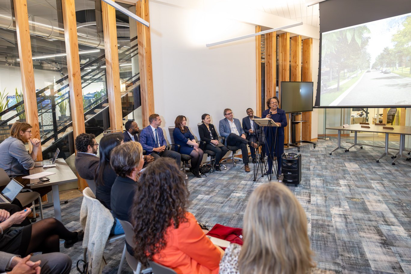 Twin Cities Habitat's Board Chair Sharon Sayles Belton address a room of media and partners.