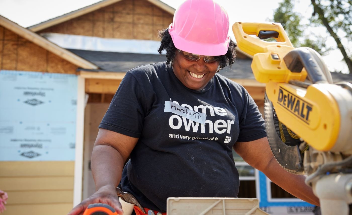 Homeowner using saw on site.