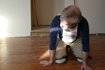 russ laying flooring.jpg