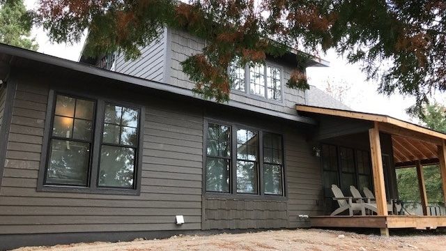 Gayle's family cabin, complete with new windows from ReStore.