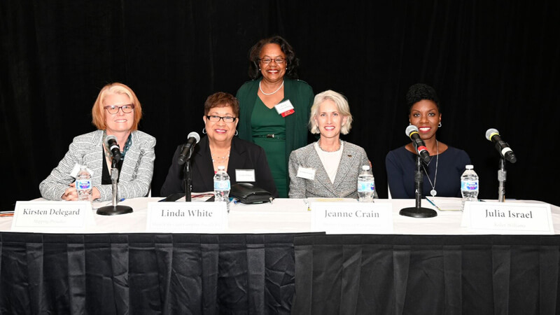 The panel of speakers at the Habitat Hope Builder's Luncheon. From left to right: Kristen Delegard, Linda White, moderator Sharon Sayles Belton, Jeanne Crain, and Julia Israel.