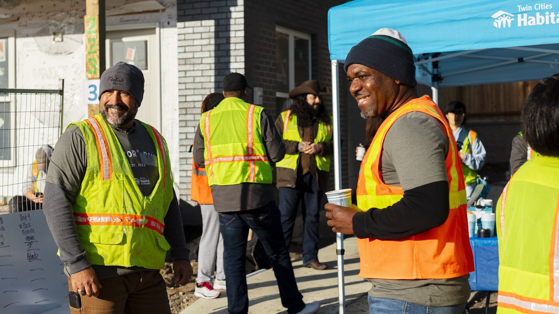 Group of volunteers smiling.